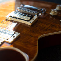 Vintage V100AFD Reissued Left-Handed, Flamed Amber