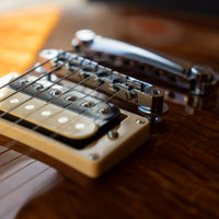 Vintage V100AFD Reissued Left-Handed, Flamed Amber