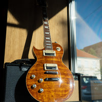 Vintage V100AFD Reissued Left-Handed, Flamed Amber