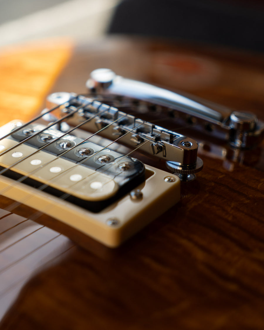 Vintage V100AFD Reissued Left-Handed, Flamed Amber