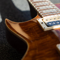 Vintage V100AFD Reissued Left-Handed, Flamed Amber