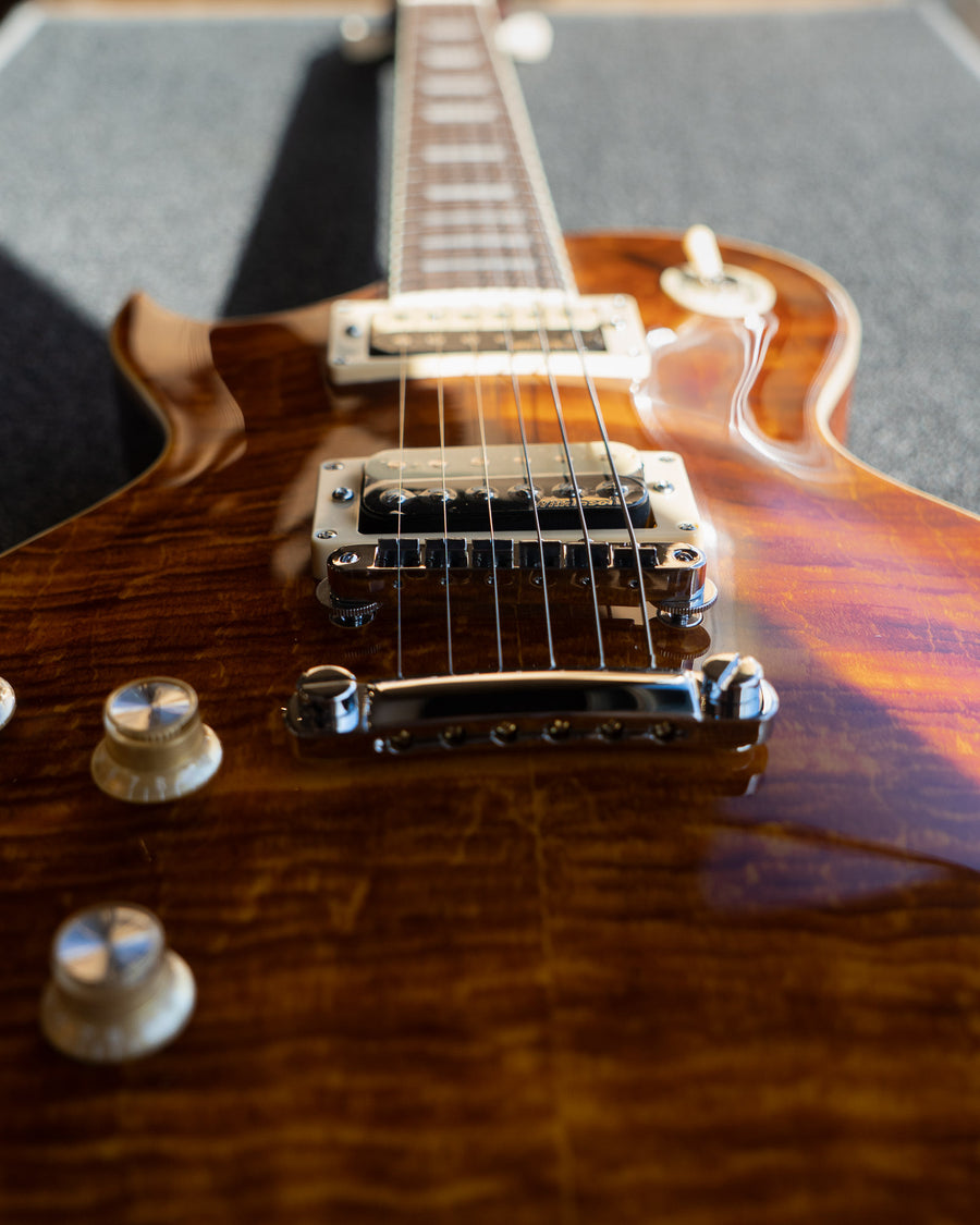 Vintage V100AFD Reissued Left-Handed, Flamed Amber