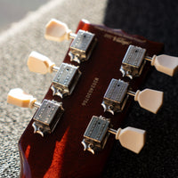 Vintage V100AFD Reissued Left-Handed, Flamed Amber